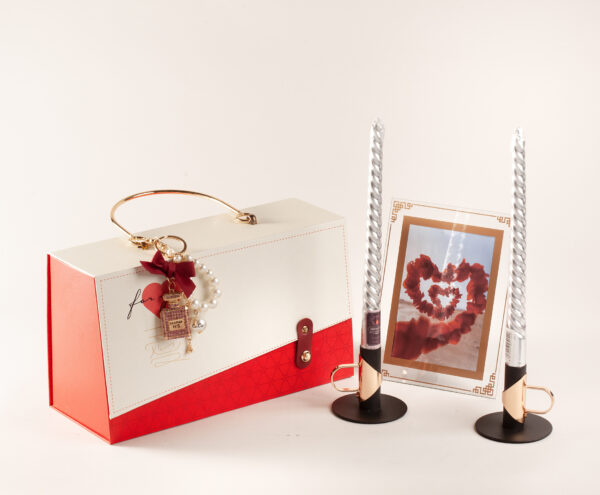 Set candleholders with candles and photo frame in a Gift Box